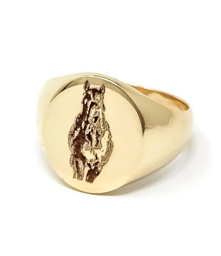 women's gold signet ring with horse engraving
