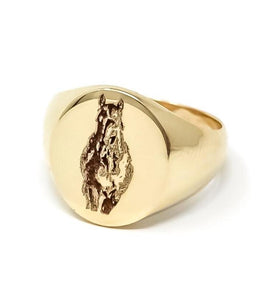 women's gold signet ring with horse engraving